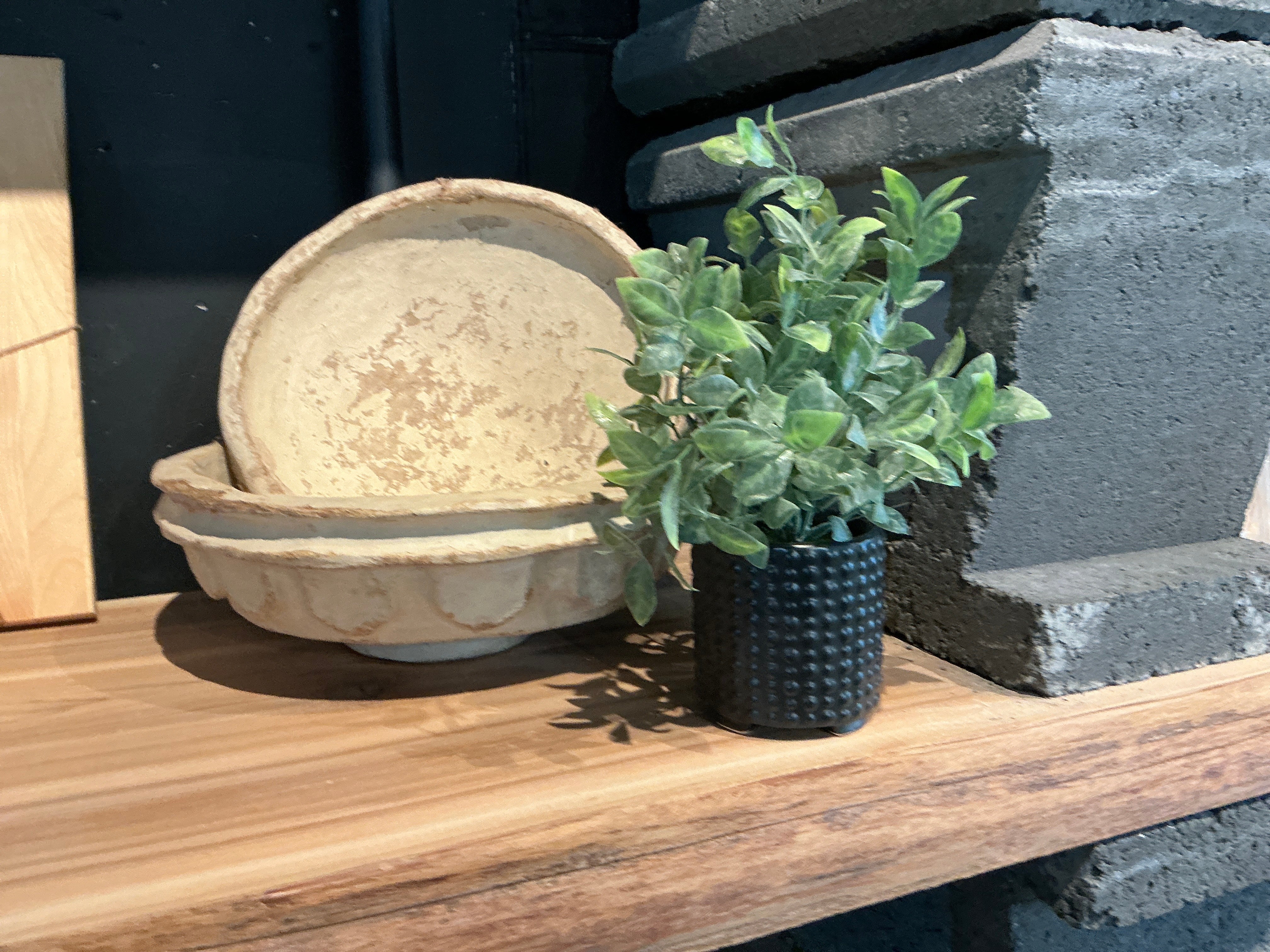 Faux floral in clay pot