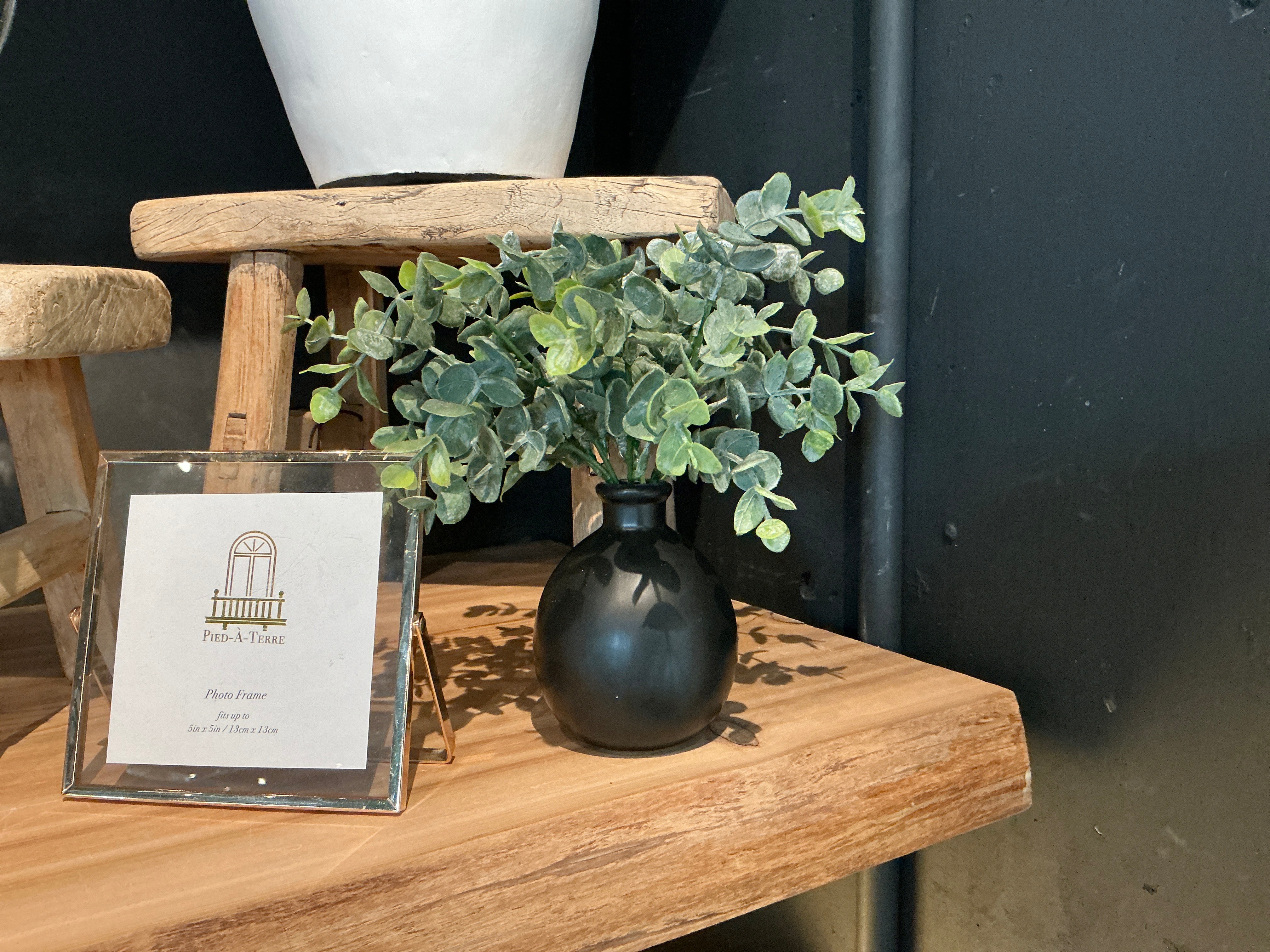 Faux floral in clay pot